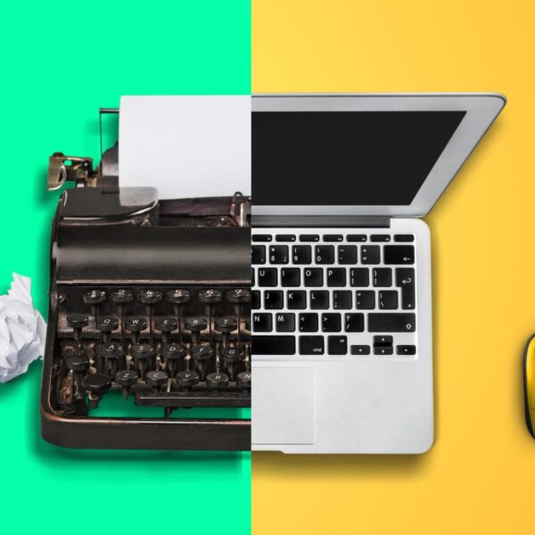 Old vs new technology. Modern computer and typewriter