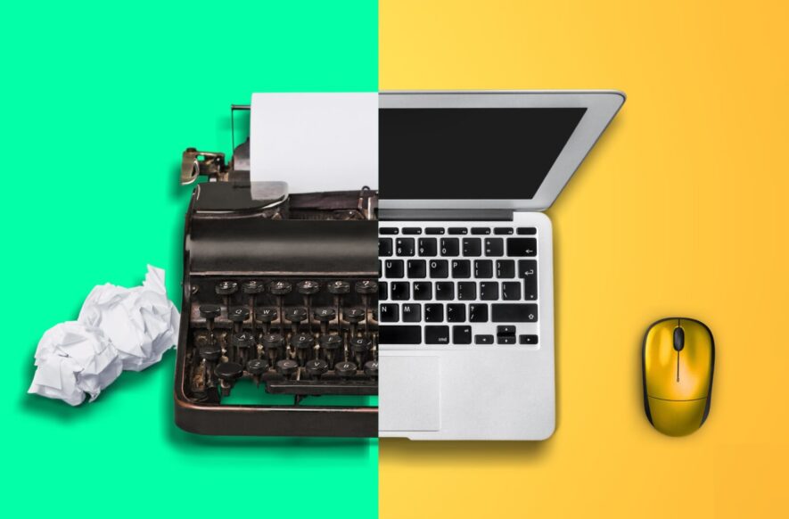 Old vs new technology. Modern computer and typewriter